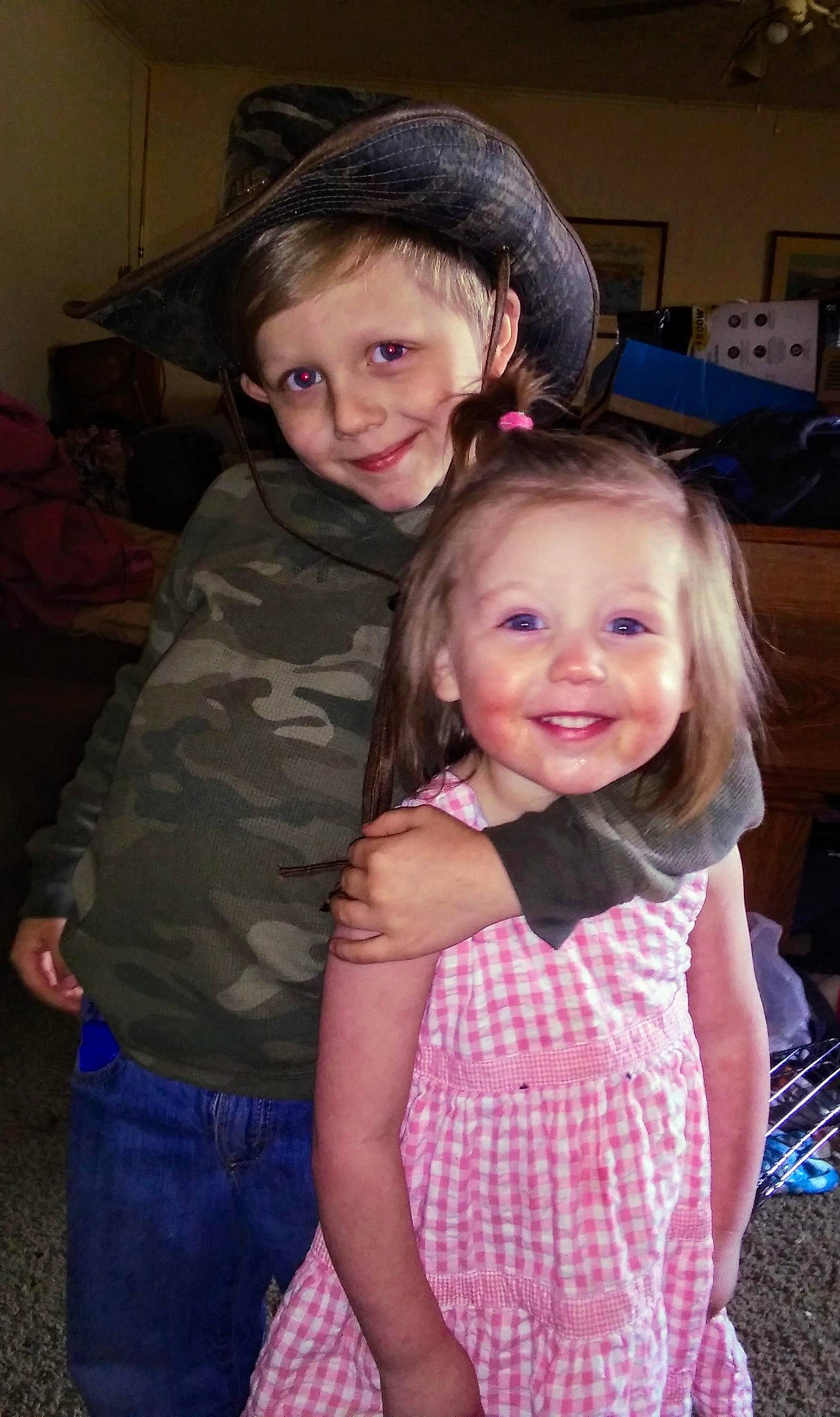 Preston is registered to the contest to win money with this photo: cheek, child, daughter, eye, face, fun, hairstyle, head, iris, joy, people, person, sibling, skin, smile, standing, toddler