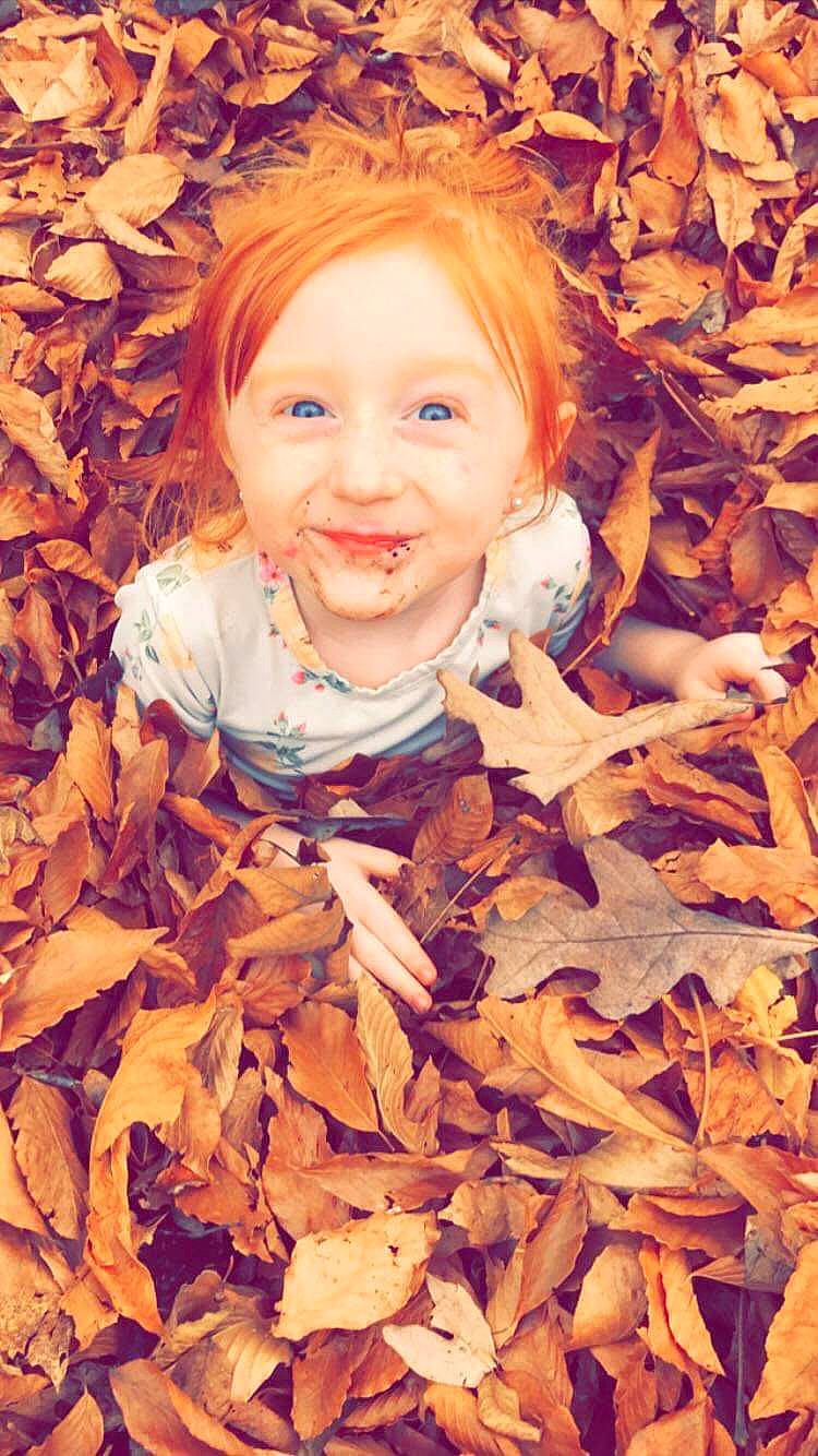 Isabelle is registered to the contest to win money with this photo: autumn, baby, beauty, cheek, child, deciduous, eye, grass, happy, head, joy, leaf, nature, orange, people_in_nature, person, plant, smile, toddler, tree