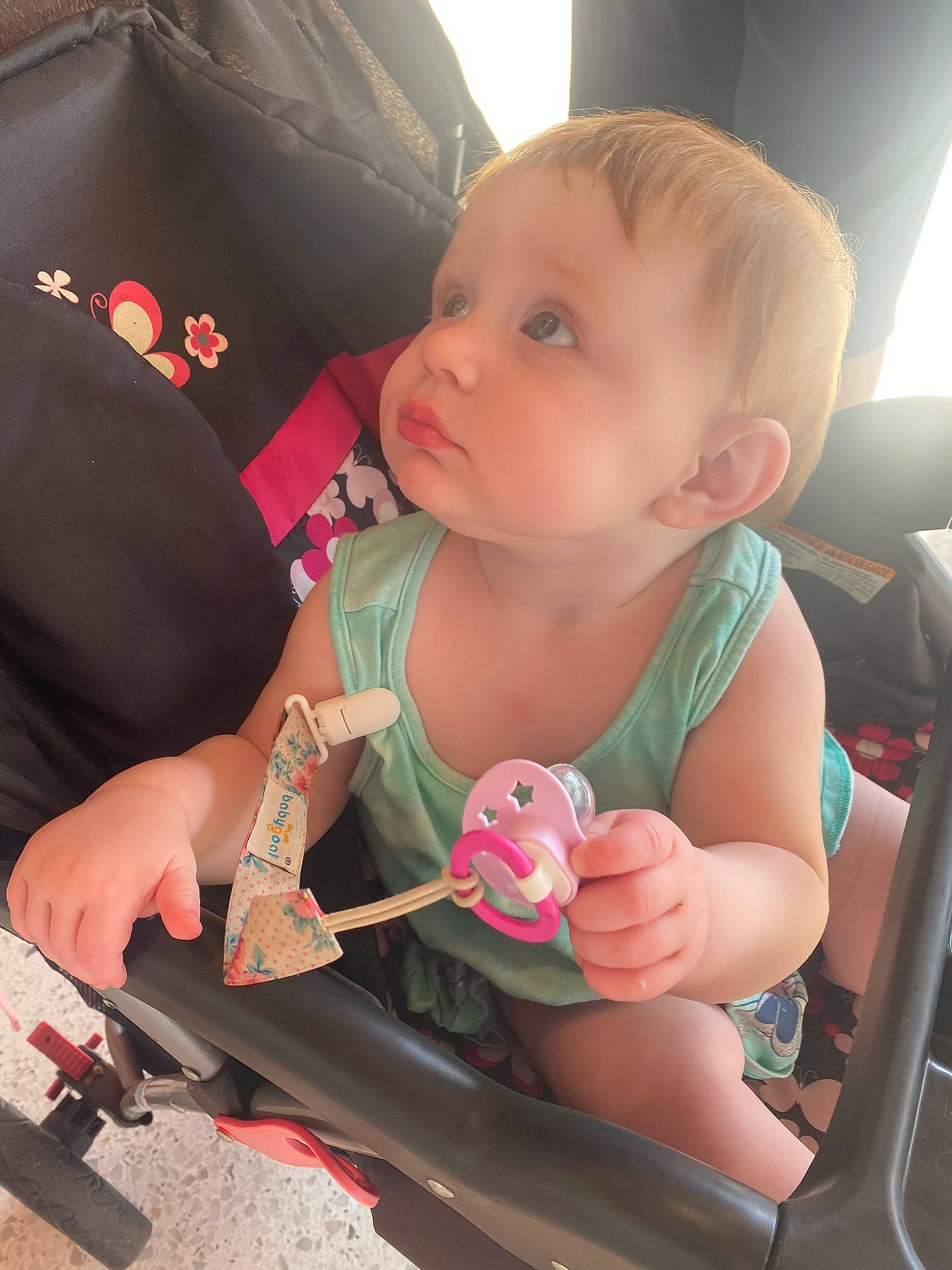 Aulora is registered to the contest to win money with this photo: baby, baby_carriage, baby_products, baby_toddler_clothing, car_seat, cheek, child, comfort, finger, hand, happy, head, nail, person, product, sitting, skin, thumb, toddler, vehicle_door