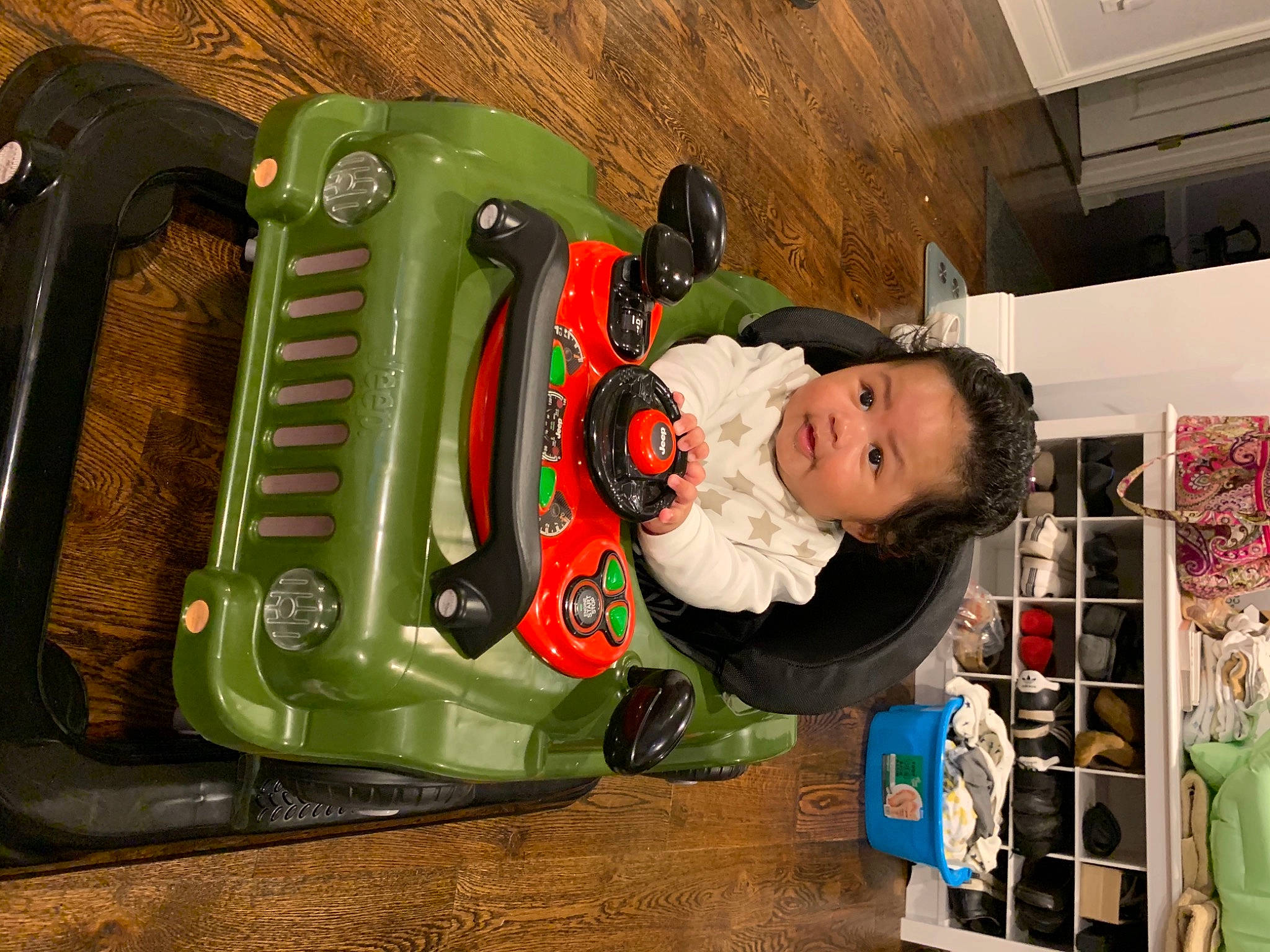 Ren is registered to the contest to win money with this photo: baby, baby_products, baby_safety, baby_toddler_clothing, baby_toys, child, comfort, fun, house, motor_vehicle, person, product, room, sitting, toddler, toy