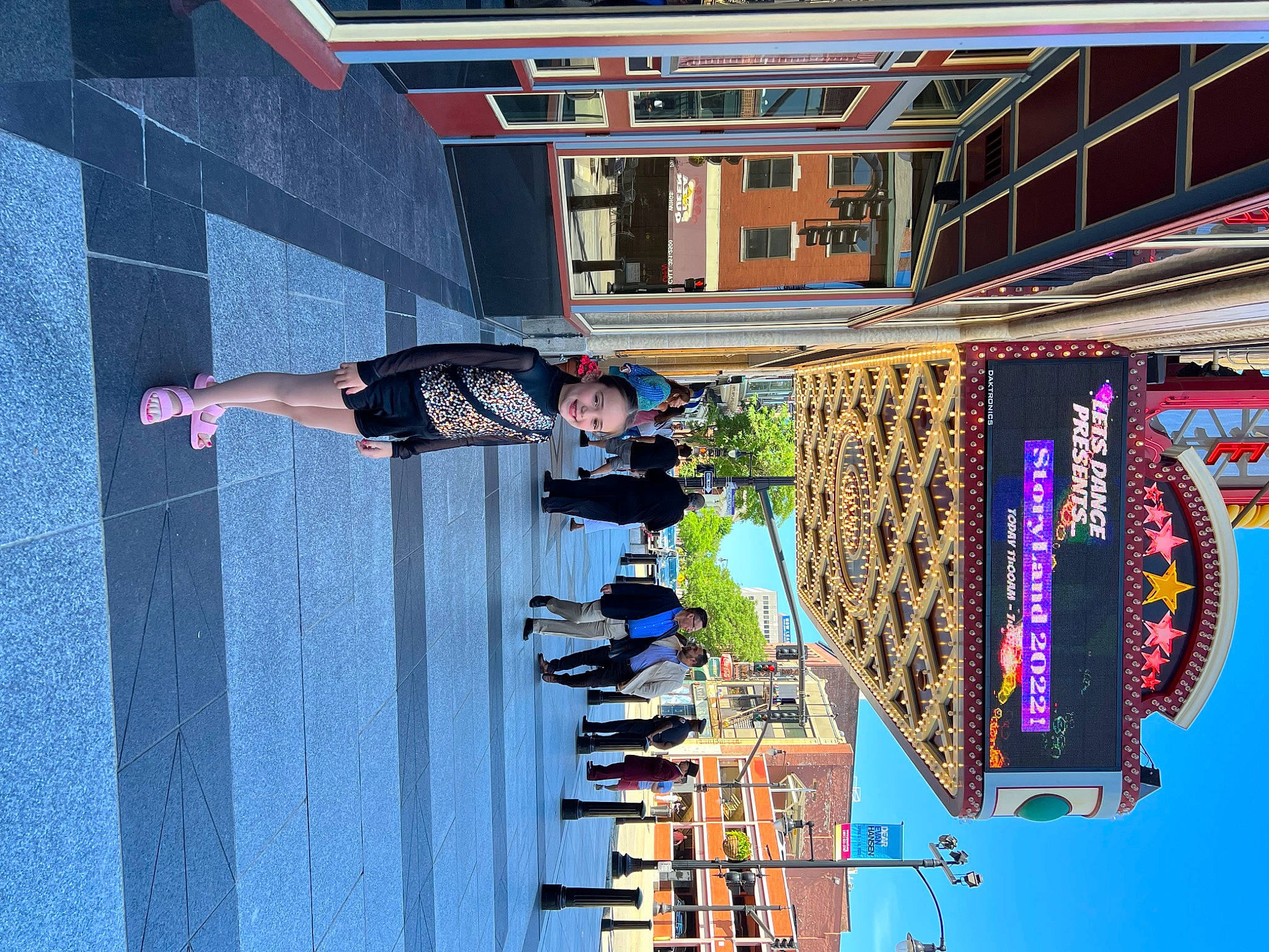 Layla is registered to the contest to win money with this photo: art, blue, building, city, composite_material, electric_blue, facade, fun, human_settlement, joy, leisure, line, mixed_use, pattern, pedestrian, person, reflection, urban_design, visual_arts, wall