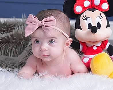 Elianna is registered to the contest to win money with this photo: baby, baby_toddler_clothing, baby_toys, cap, child, facial_expression, fashion_accessory, font, fun, happy, headwear, magenta, person, pink, plush, skin, smile, stuffed_toy, textile, toddler