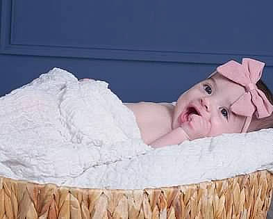 Elianna joined the competition — help win amazing prizes! baby, baby_products, baby_toddler_clothing, bedding, bridal_accessory, cap, child, comfort, event, eyelash, fashion_accessory, fur, hair_accessory, headpiece, headwear, linens, nap, person, portrait_photography, room