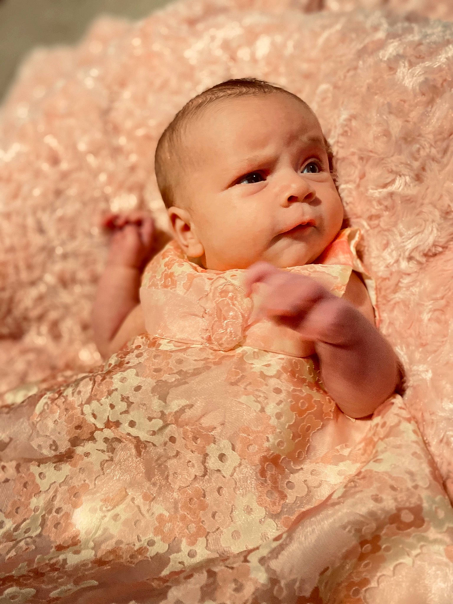 Hailey is registered to the contest to win money with this photo: baby, baby_toddler_clothing, beauty, cheek, child, clothing, dress, embellishment, event, eye, flash_photography, happy, human_body, iris, peach, person, pink, sitting, skin, toddler