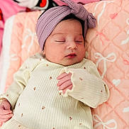 Madison Magaly is registered to the contest to win money with this photo: newborn, baby, sleeping, infant, portrait, headband, pink, blanket, bed, bedding, clothing, onesie, hands, face, closed_eyes, peaceful, indoors, nursery, cozy, photography