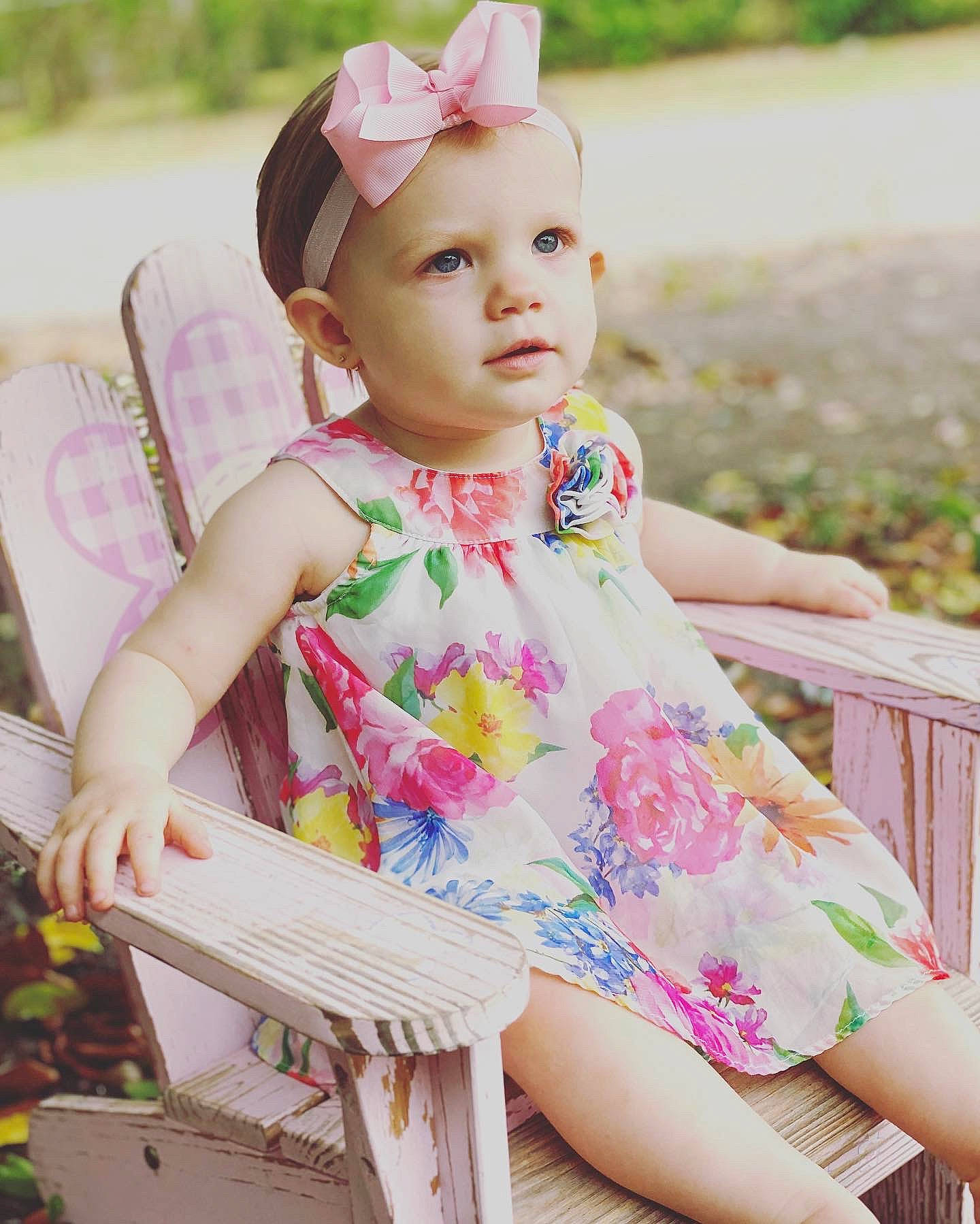 Lorelai joined the competition — help win amazing prizes! baby, baby_toddler_clothing, child, child_model, design, dress, fashion_accessory, hair_accessory, headband, headgear, pattern, person, pink, plant, play, sitting, spring, summer, textile, toddler