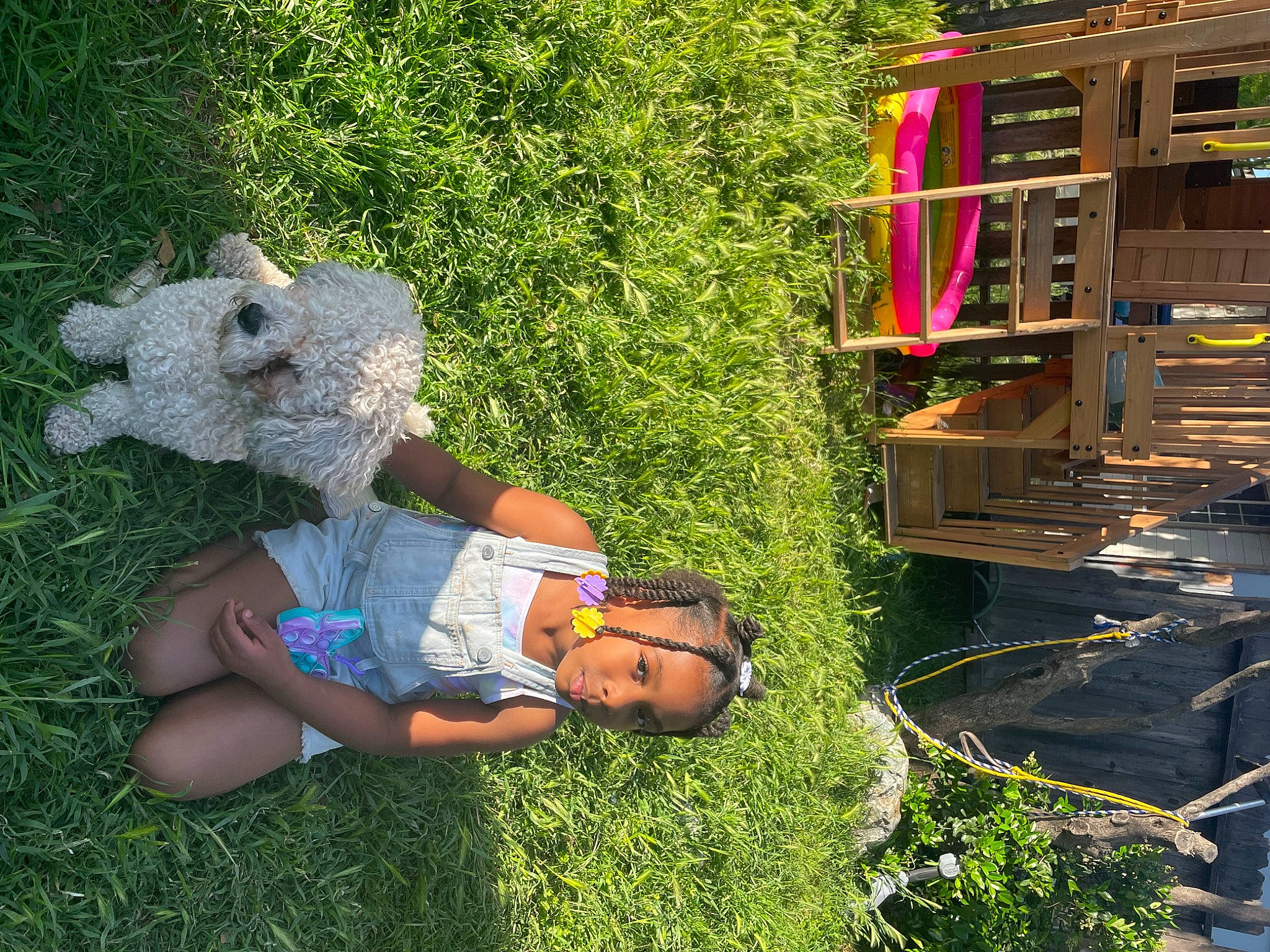 Ah Stori is registered to the contest to win money with this photo: botany, child, fun, garden, grass, happy, hat, landscape, lawn, lawn_ornament, leaf, leisure, nature, people_in_nature, person, plant, shrub, sitting, spring, vegetation