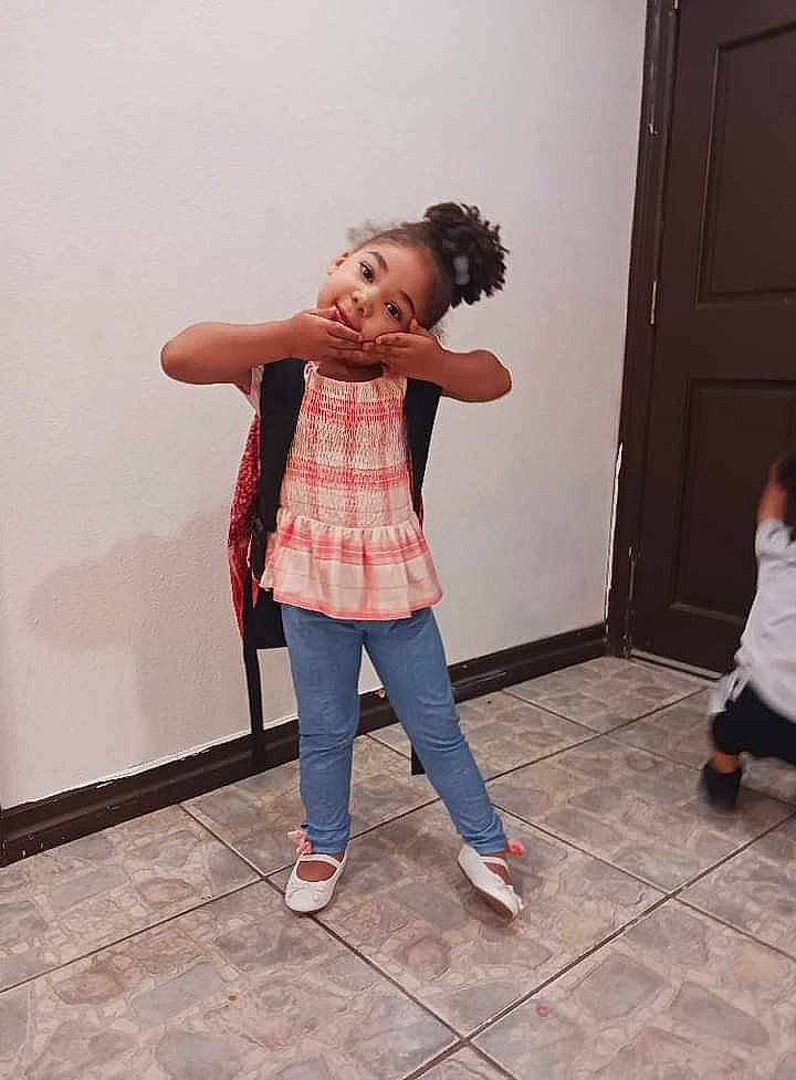 Devinity is registered to the contest to win money with this photo: beauty, door, fashion_design, floor, flooring, fun, gesture, happy, human_leg, joint, knee, leg, magenta, pattern, person, shoulder, sleeve, thigh, thumb, toddler