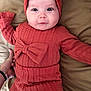 Allivia joined the competition — help win amazing prizes! baby, infant, child, knitwear, headband, bow, orange_clothing, bed, blanket, person, hand, wide_eyes, cute, cozy, portrait, lying_down, apparel, smile, human, indoor