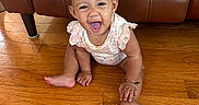 Jai-Lyanna joined the competition — help win amazing prizes! baby, barefoot, bracelet, candid, child, floral_outfit, front_view, furniture, happy, hardwood_floor, home, indoors, infant, laughing, leather_sofa, portrait, short_hair, sitting, smiling, toddler