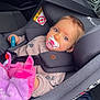 Eloa participe au concours pour gagner de l'argent avec cette photo : baby, pacifier, car_seat, child, plush_toy, seatbelt, vehicle_interior, clothing, face, head, person, car, window, seat, toy, infant, child_safety, cute, indoor, baby_toy
