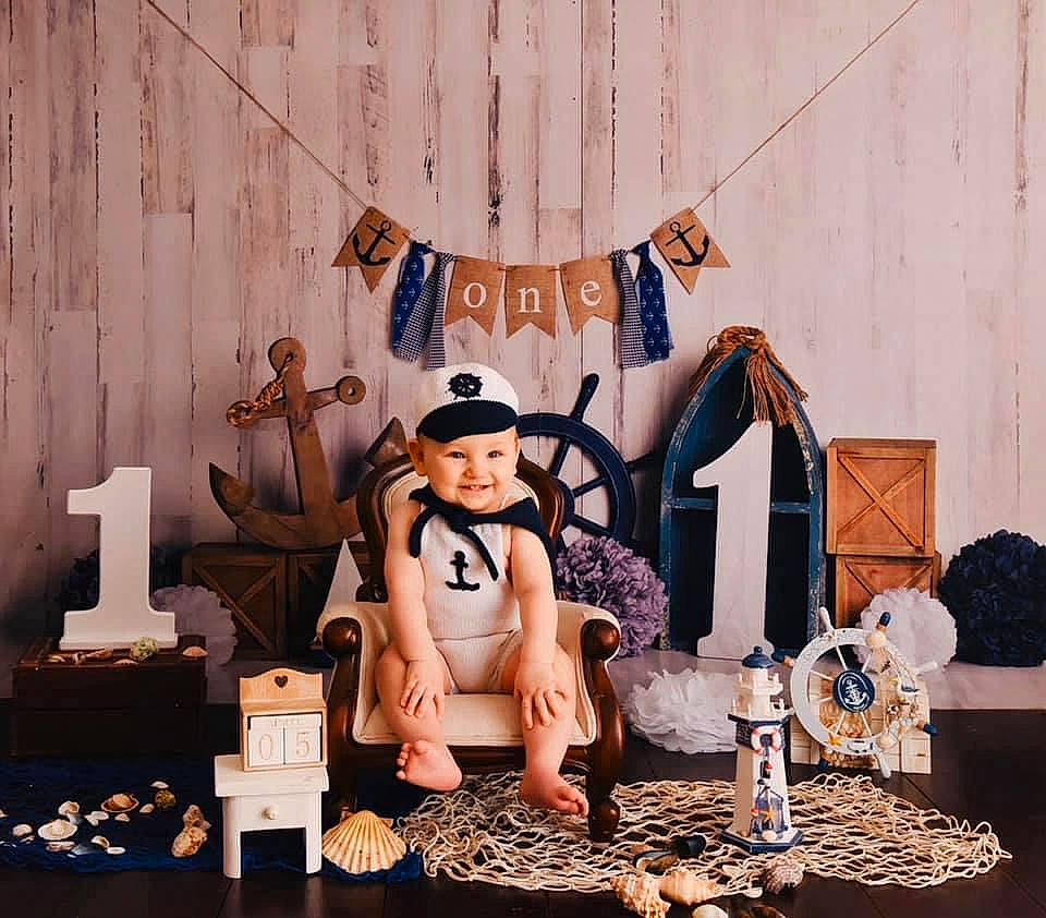 Darius is registered to the contest to win money with this photo: action_figure, animation, art, doll, entertainment, event, fashion, fashion_design, figurine, fun, happy, hat, headwear, interior_design, joy, performing_arts, person, recreation, room, stage