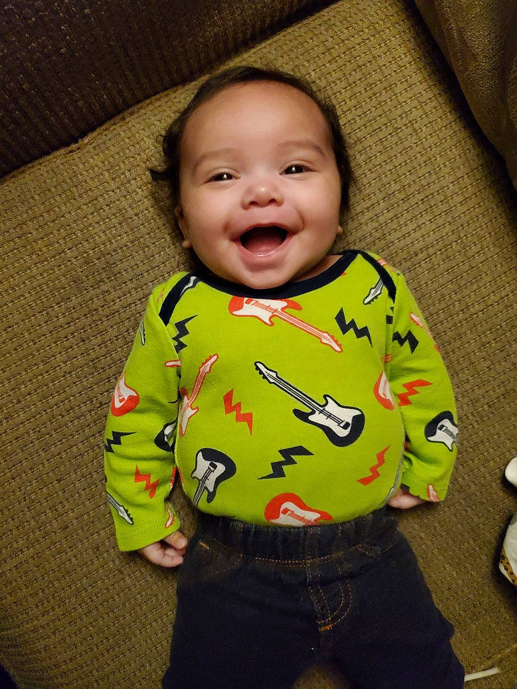 Dominick joined the competition — help win amazing prizes! baby, baby_toddler_clothing, cheek, chin, clothing, comfort, face, facial_expression, flooring, happy, human, jeans, nose, person, skin, sleeve, smile, standing, t_shirt, textile