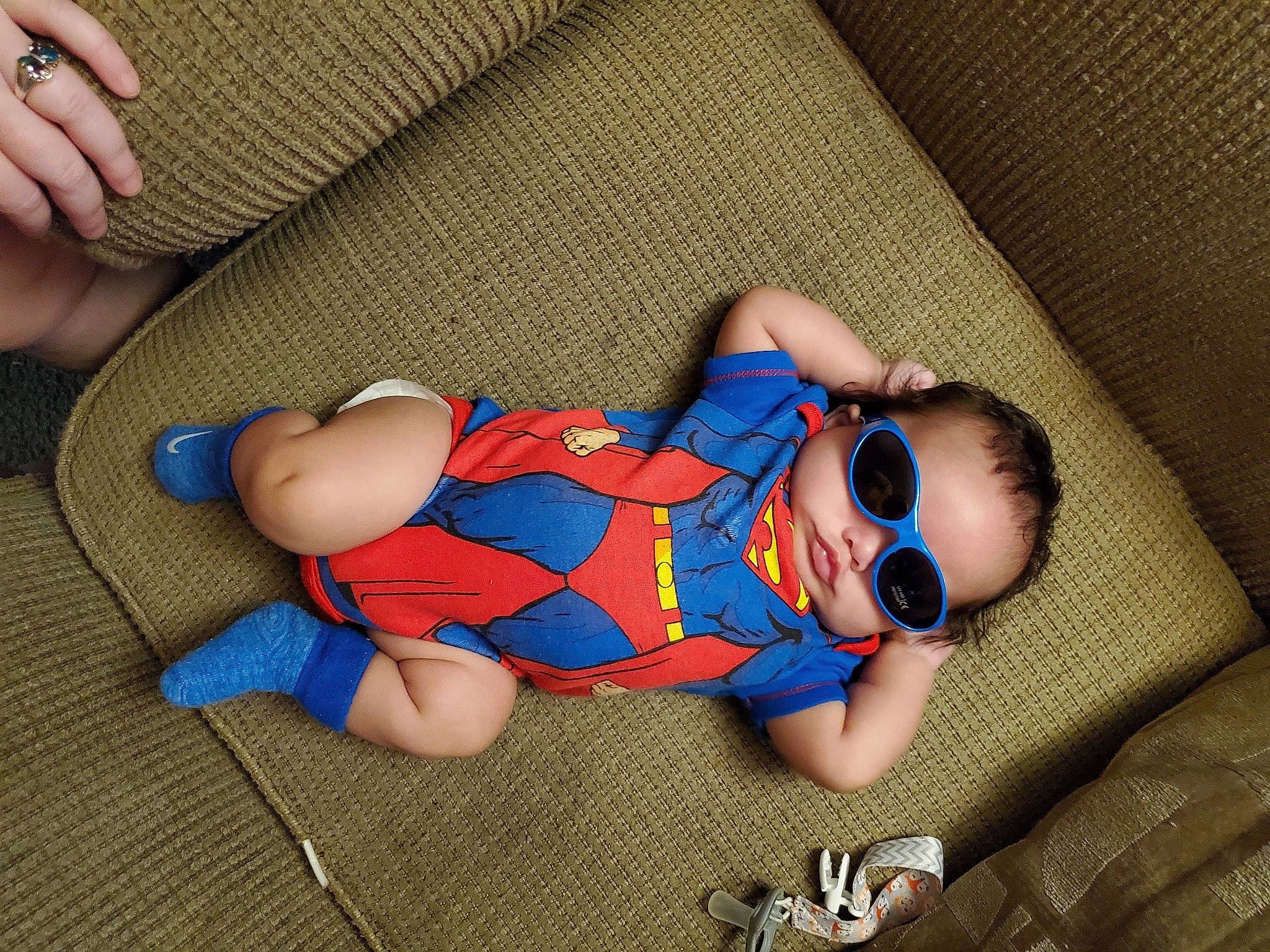 Dominick is registered to the contest to win money with this photo: baby, baby_products, baby_sleeping, baby_toddler_clothing, child, comfort, electric_blue, finger, human_body, human_leg, joint, leg, mouth, nail, pattern, person, skin, sock, thigh, thumb