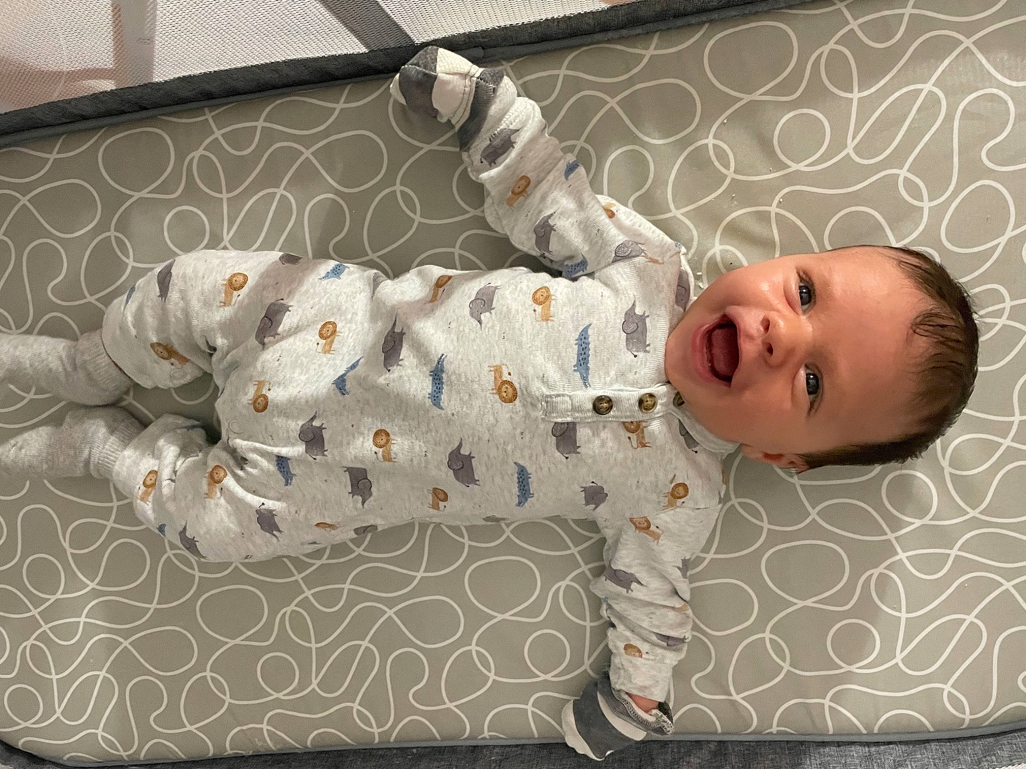 Bentley is registered to the contest to win money with this photo: baby, baby_products, baby_safety, baby_toddler_clothing, baby_toys, child, comfort, floor, flooring, foot, happy, linens, pattern, person, room, sleeve, smile, toddler