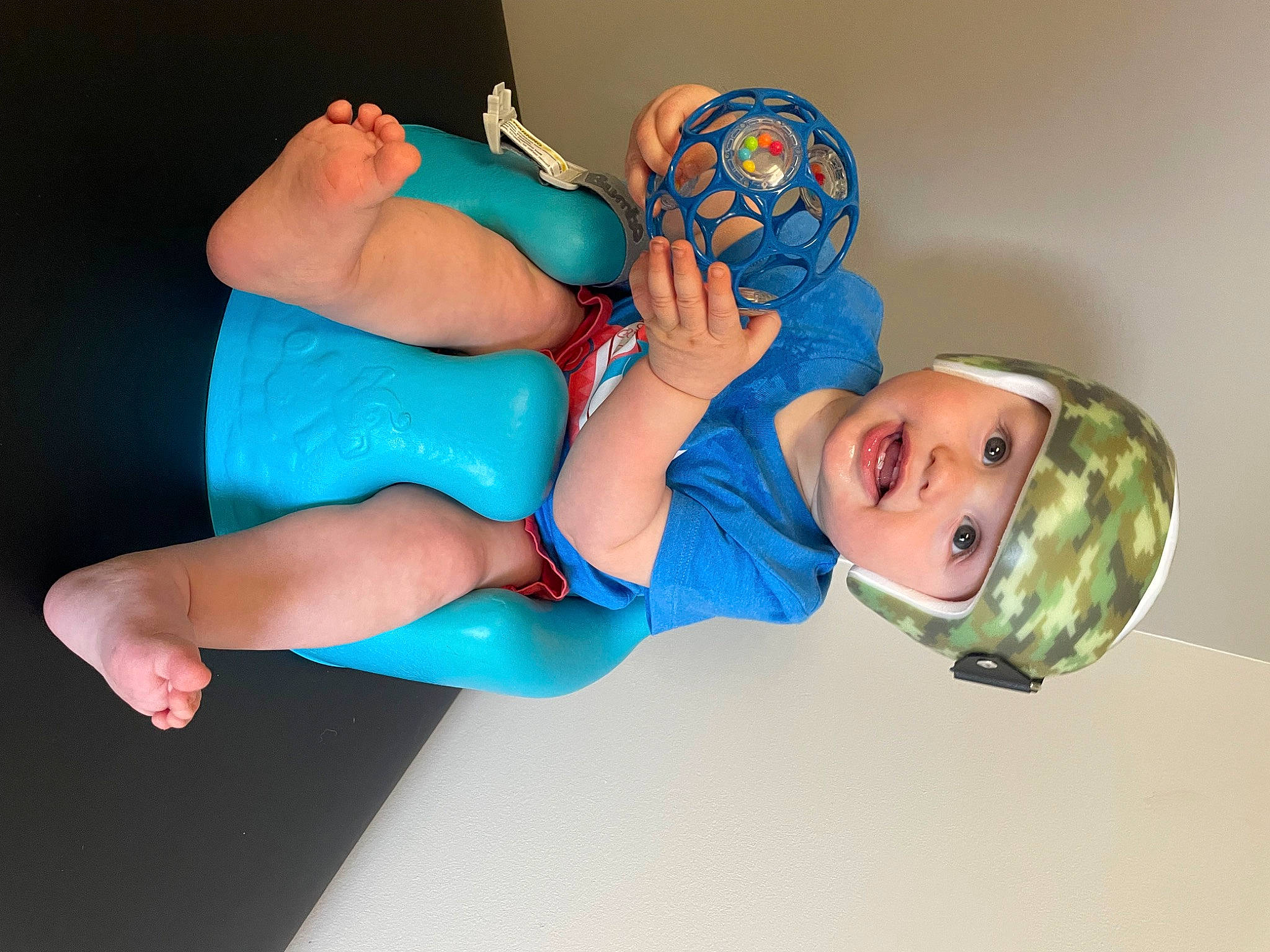 Caysen is registered to the contest to win money with this photo: abdomen, baby, baby_toddler_clothing, chest, child, comfort, elbow, electric_blue, fashion_accessory, happy, headwear, human_leg, knee, person, personal_protective_equipment, smile, sportswear, stomach, thigh, toddler