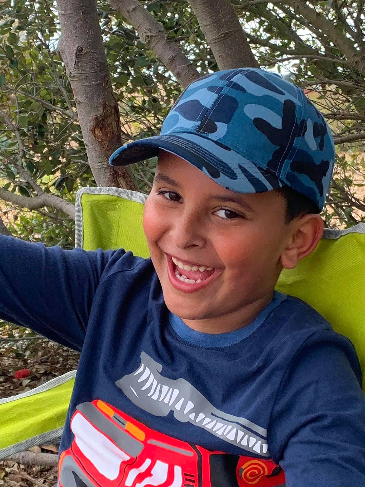 Ibrahim joined the competition — help win amazing prizes! adventure, baseball_cap, cap, child, competition_event, cool, electric_blue, fun, grass, happy, headgear, headwear, joy, leaf, leisure, outdoor_recreation, person, personal_protective_equipment, plant, recreation