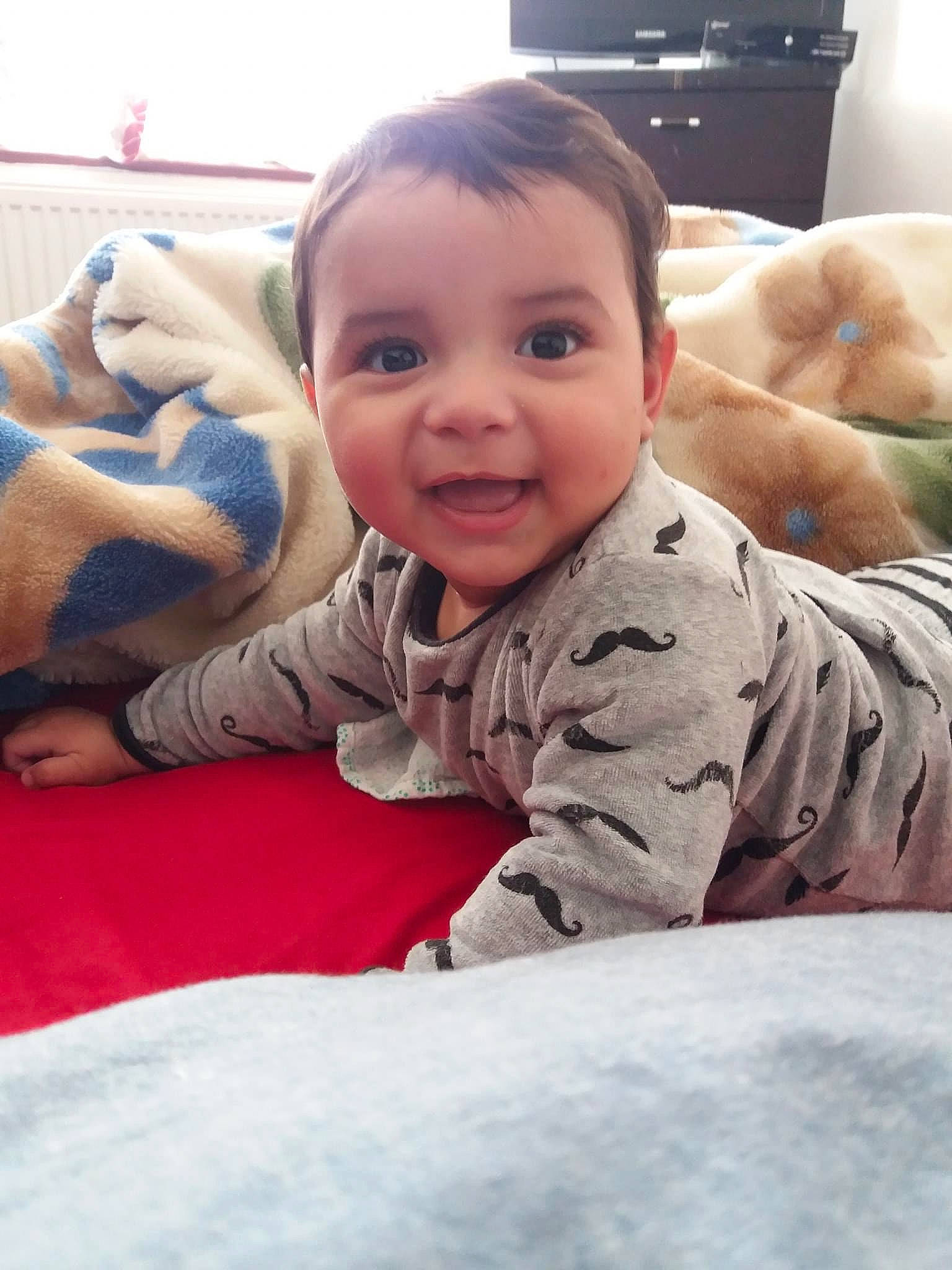 Ismail joined the competition — help win amazing prizes! arm, baby_toddler_clothing, cheek, comfort, eye, face, finger, hand, happy, head, human_body, leg, lip, mammal, mouth, nose, person, skin, smile, textile