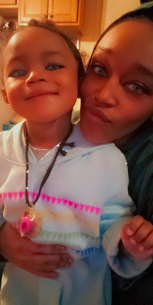 Bella is registered to the contest to win money with this photo: cheek, chin, ear, eyebrow, eyelash, face, facial_expression, finger, forehead, gesture, happy, iris, joy, lip, mouth, nose, organ, person, pink, skin