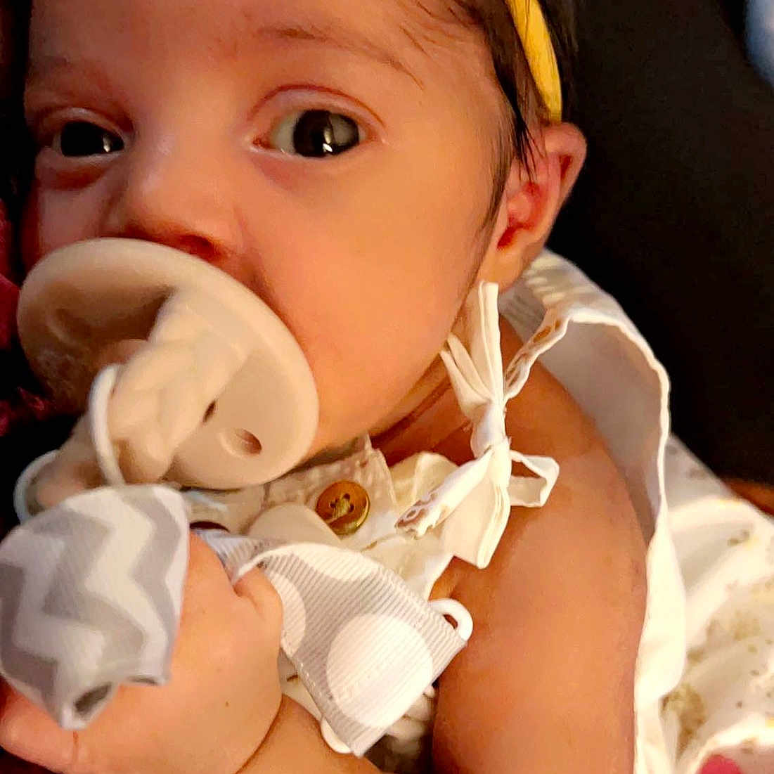 Rosalie joined the competition — help win amazing prizes! baby, baby_toddler_clothing, cheek, dress, eye, eyebrow, eyelash, face, facial_expression, gesture, hairstyle, hand, happy, headgear, iris, lip, mouth, nose, pink, skin