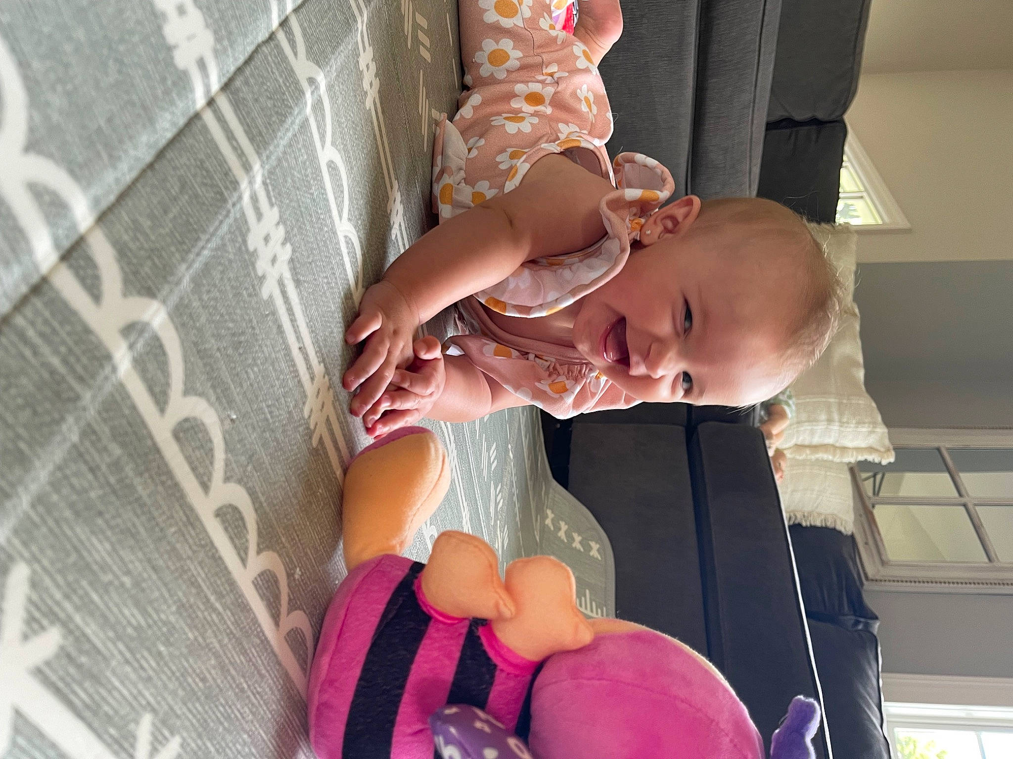 Harlow is registered to the contest to win money with this photo: baby, baby_products, baby_toddler_clothing, chest, child, event, foot, hat, human_leg, leg, mouth, nail, pattern, person, pink, sitting, skin, sunglasses, thigh, thumb