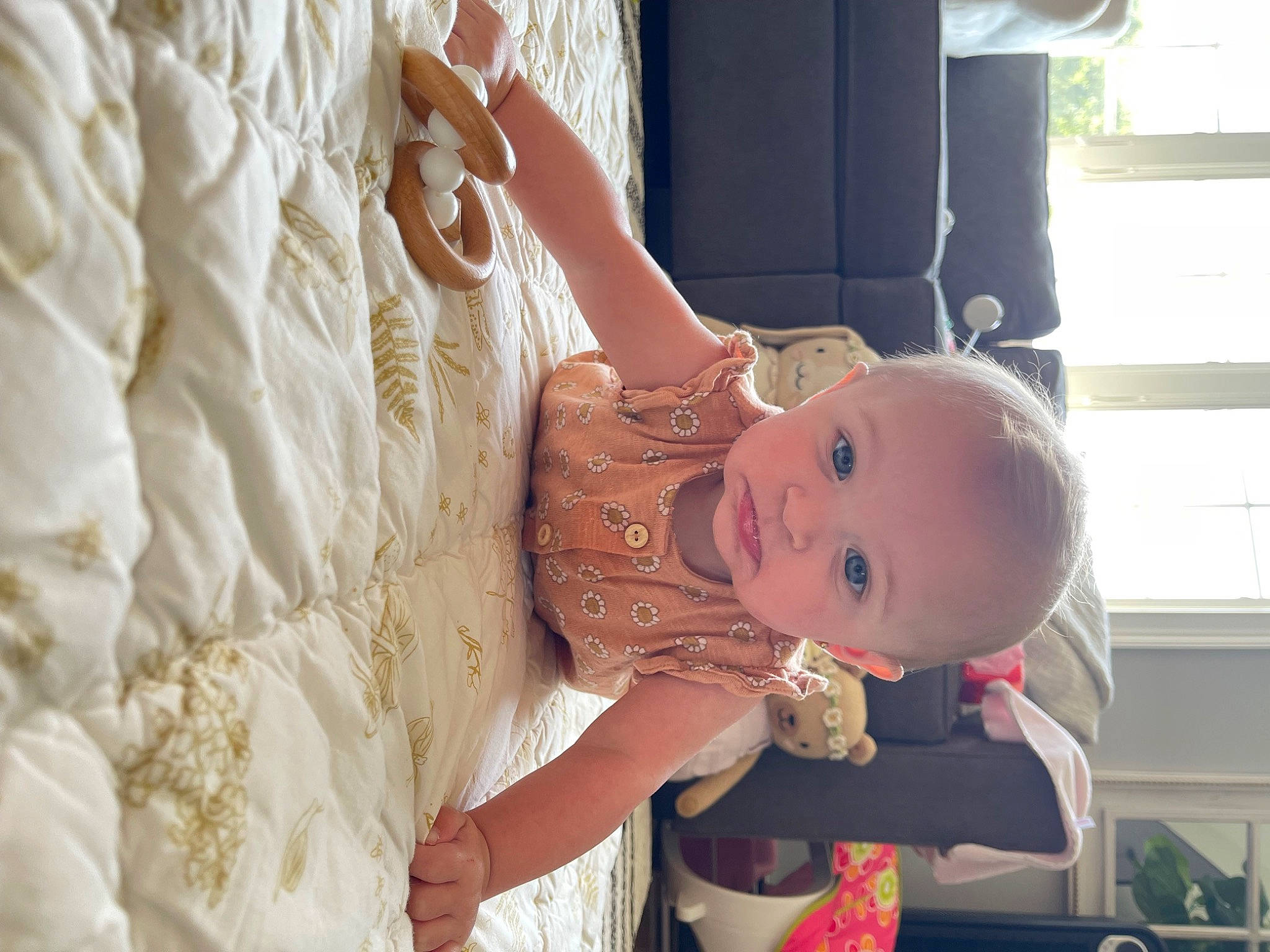 Harlow is registered to the contest to win money with this photo: baby, baby_products, baby_toddler_clothing, bridal_accessory, bridal_clothing, child, doll, dress, embellishment, event, fashion_design, gown, happy, pattern, peach, person, pink, skin, toddler, toy