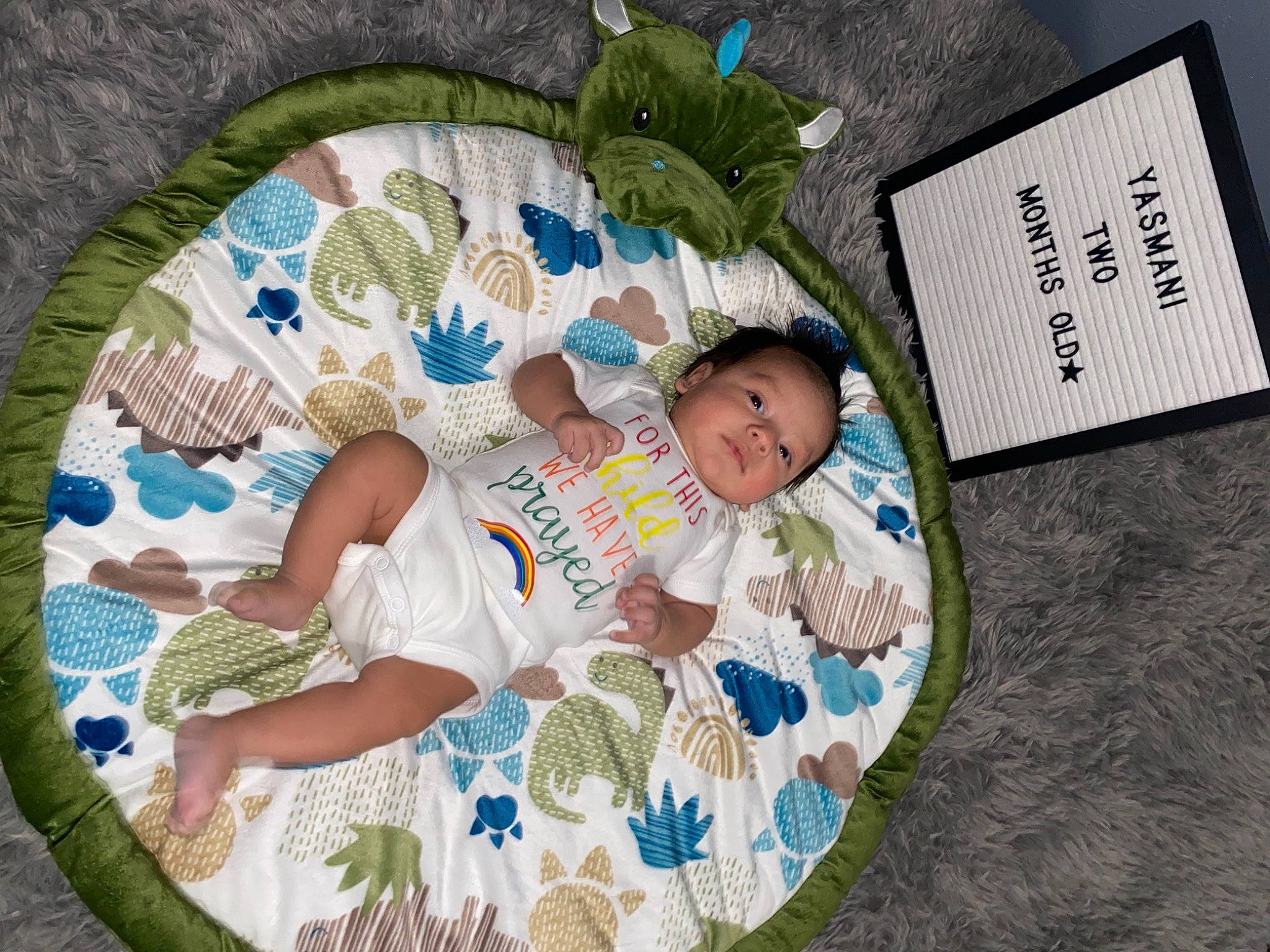 Yasmani is registered to the contest to win money with this photo: baby, baby_products, baby_sleeping, baby_toddler_clothing, baby_toys, bedding, bedtime, child, circle, comfort, grass, leisure, linens, pattern, person, play, quilt, room, sitting, t_shirt