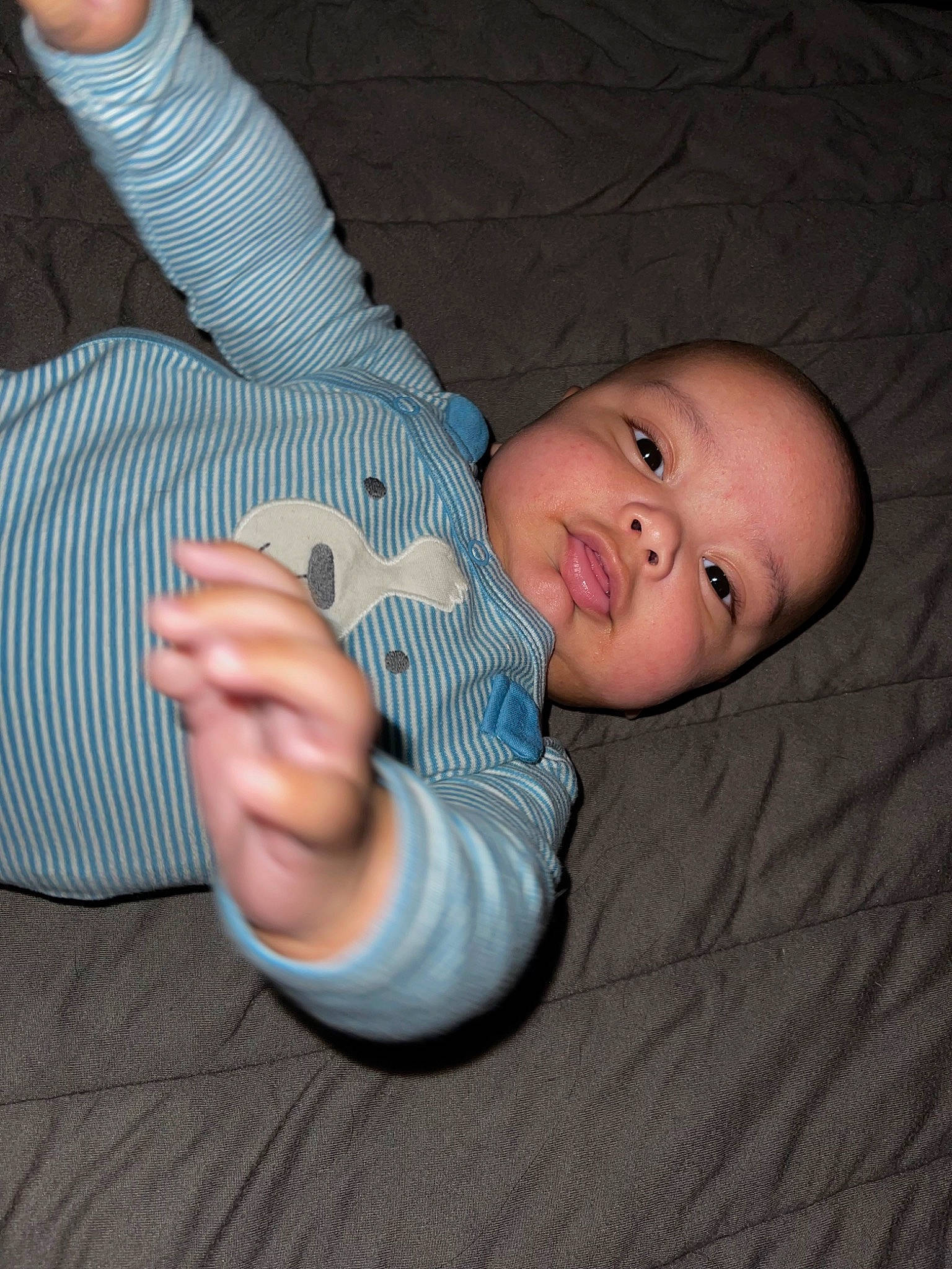 Thiago is registered to the contest to win money with this photo: baby, baby_products, baby_toddler_clothing, cheek, child, comfort, elbow, finger, foot, gesture, hand, linens, nail, pattern, person, sitting, sleeve, thumb, toddler, wood