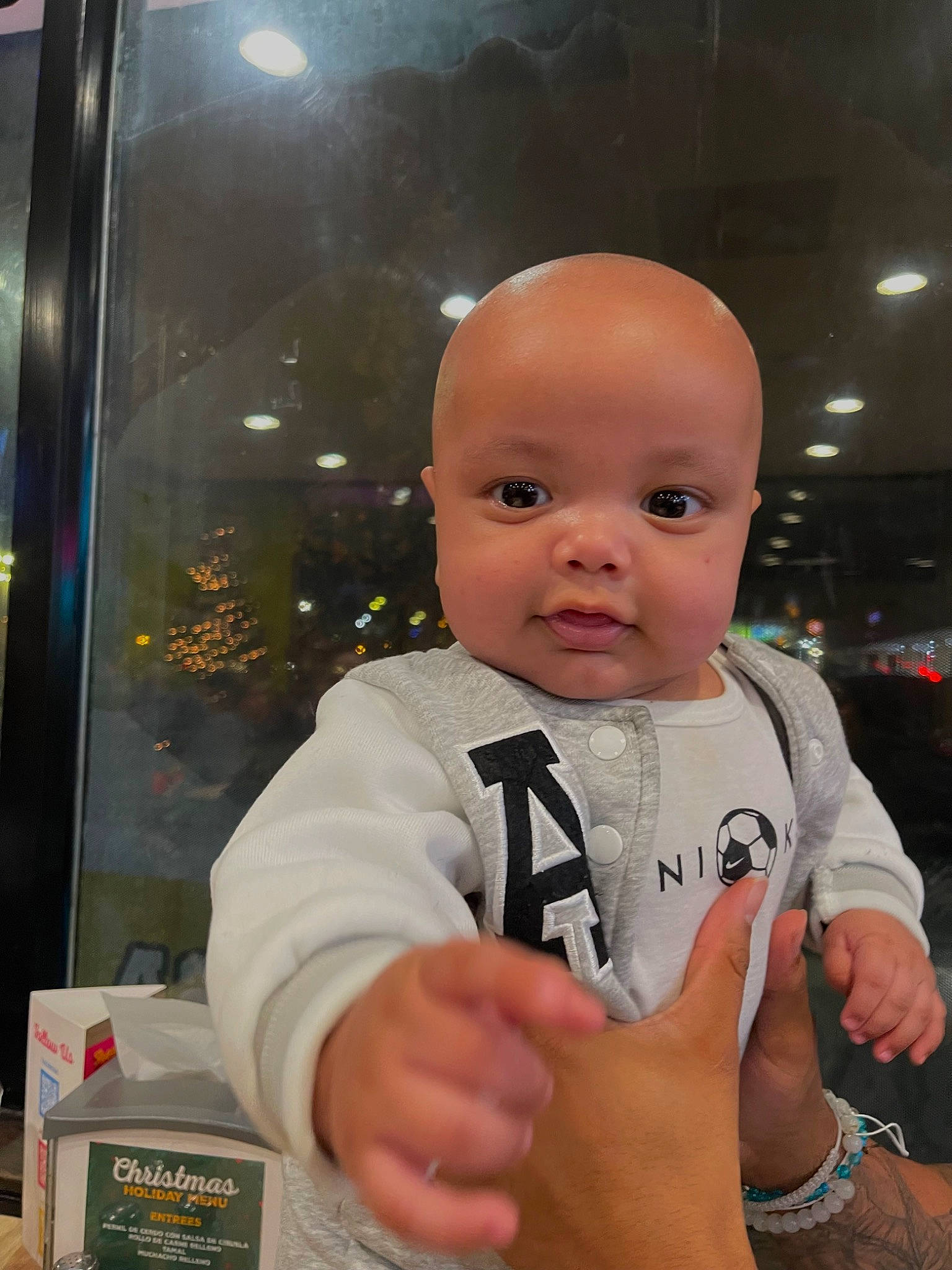 Thiago joined the competition — help win amazing prizes! baby, baby_toddler_clothing, box, cheek, child, fun, gesture, glass, happy, machine, nail, person, refrigerator, room, sitting, sleeve, t_shirt, thumb, toddler