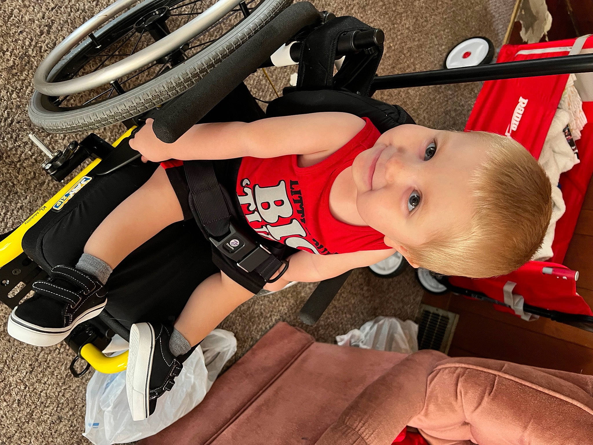 Jude is registered to the contest to win money with this photo: automotive_exterior, automotive_tire, automotive_wheel_system, baby, baby_toddler_clothing, bicycle_tire, helmet, leg, person, rim, shorts, sports_equipment, sports_gear, synthetic_rubber, thigh, tire, tire_care, toddler, tread, vehicle