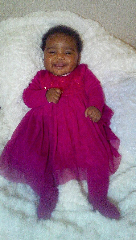 Hadijatou a rejoint le concours — aidez-le/la à gagner de superbes lots ! child, joy, magenta, outerwear, person, pink, skin, smile, toddler
