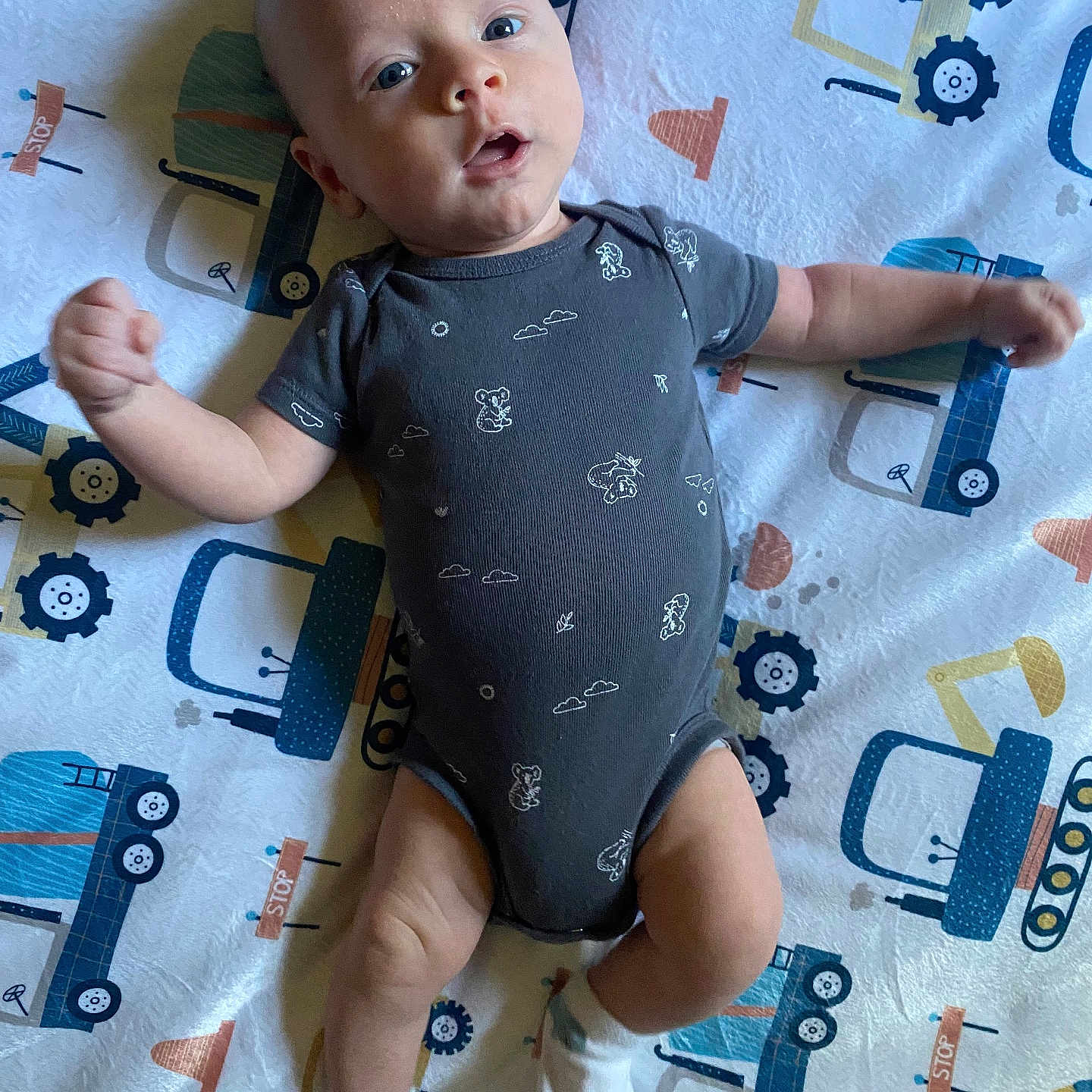 Booker is registered to the contest to win money with this photo: baby, bodypart, clothing, crawling, cushion, face, finger, hand, happy, head, homedecor, hosiery, person, photography, portrait, sitting, sleeve, sock, standing, yawning