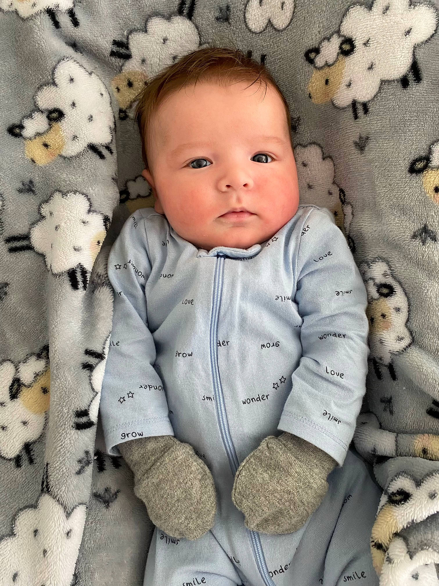 Dustin joined the competition — help win amazing prizes! baby, baby_toddler_clothing, cheek, child, collar, comfort, face, grey, happy, linens, outerwear, pattern, people, person, product, sitting, skin, sleeve, textile, toddler