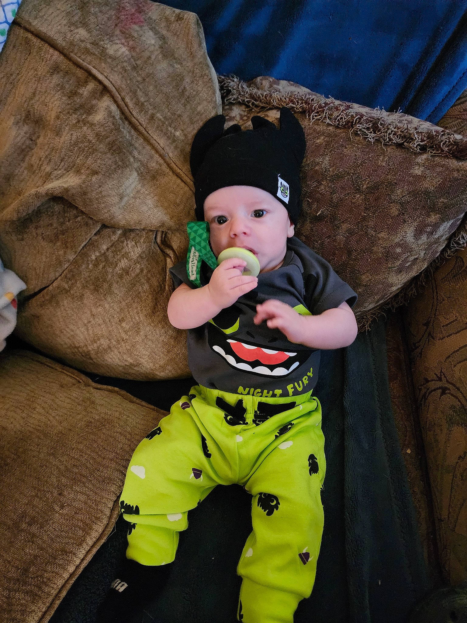 Conrad joined the competition — help win amazing prizes! baby, baby_carriage, baby_products, baby_toddler_clothing, baseball_cap, beanie, cap, child, comfort, costume, costume_hat, fun, hat, headwear, person, personal_protective_equipment, sitting, sleeve, sun_hat, t_shirt