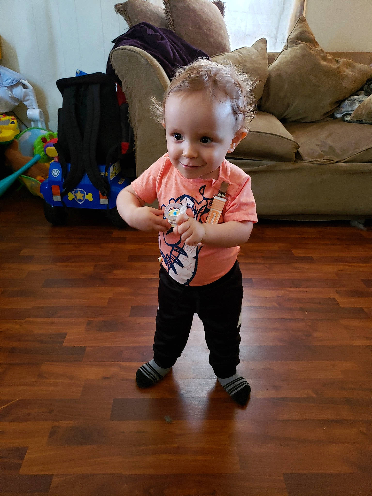 Logan joined the competition — help win amazing prizes! baby, child, floor, flooring, hardwood, joy, person, room, skin, standing, toddler, wood