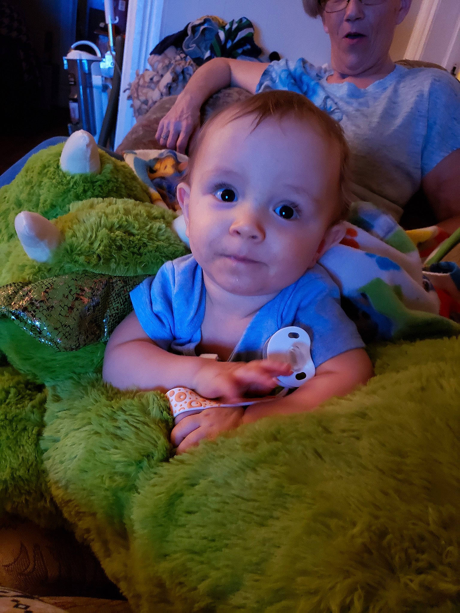 Logan is registered to the contest to win money with this photo: baby, child, eye, person, smile, toddler, toy, world