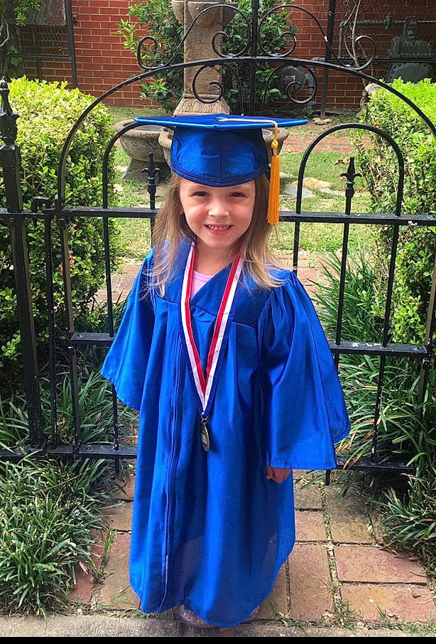 Karoline is registered to the contest to win money with this photo: academic_dress, clothing, college, electric_blue, event, graduation, headgear, headwear, joy, mortarboard, outerwear, person, phd, robe, scholar, smile, student, uniform