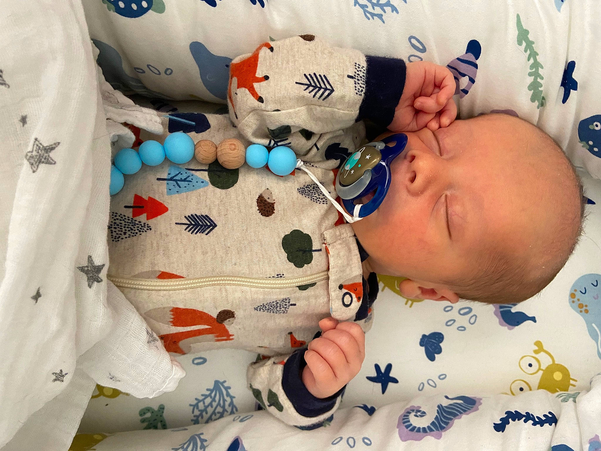 Kayson is registered to the contest to win money with this photo: baby, baby_products, baby_safety, baby_sleeping, baby_toddler_clothing, bedtime, carmine, child, comfort, happy, hat, linens, pattern, person, plastic, room, sleeve, textile, toddler, toy