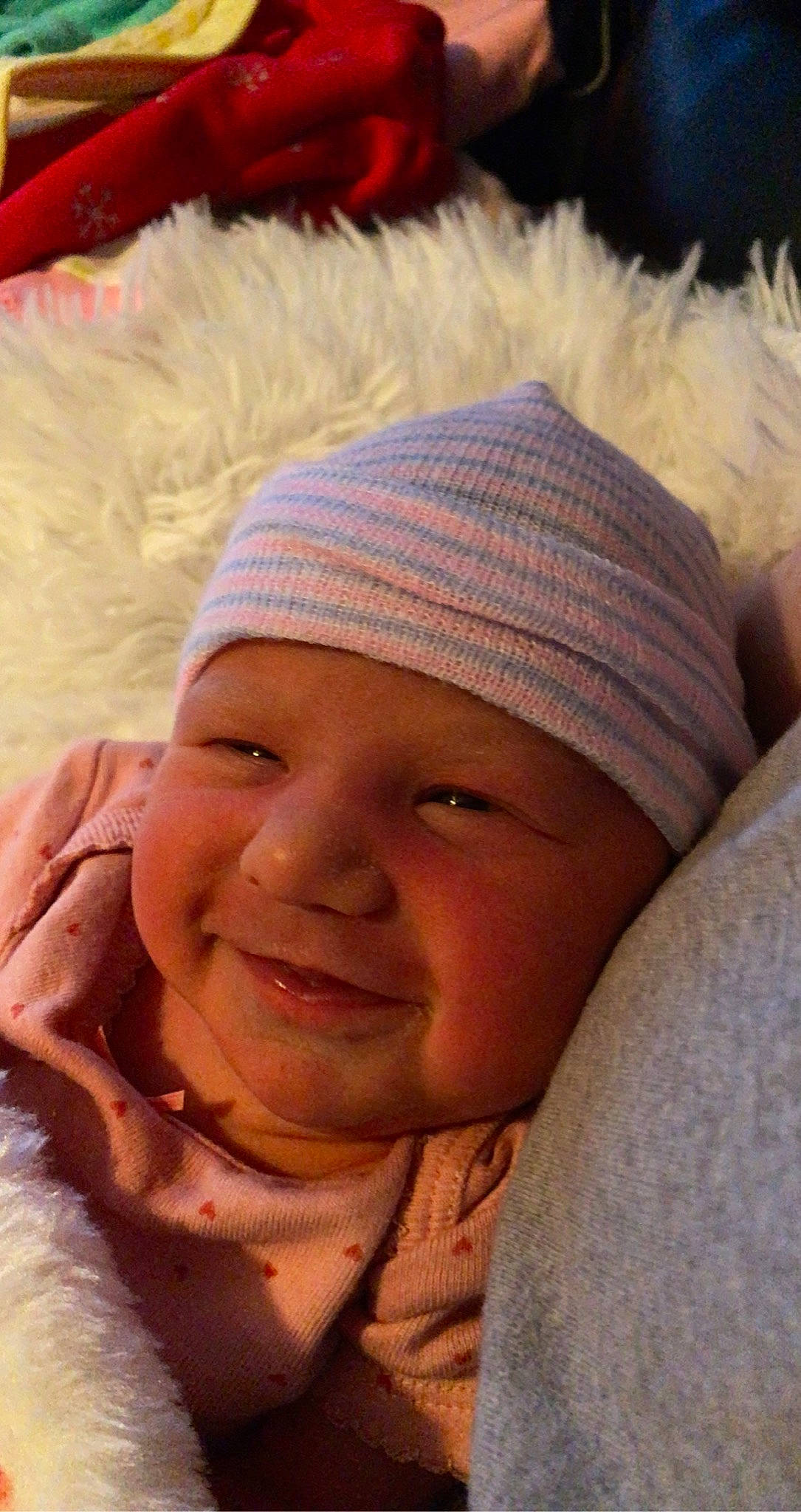 Braelyn is registered to the contest to win money with this photo: baby, baby_toddler_clothing, bonnet, cheek, child, chin, close_up, comfort, costume_accessory, eyebrow, facial_expression, fur, headgear, headwear, joy, lip, nose, person, photography, skin