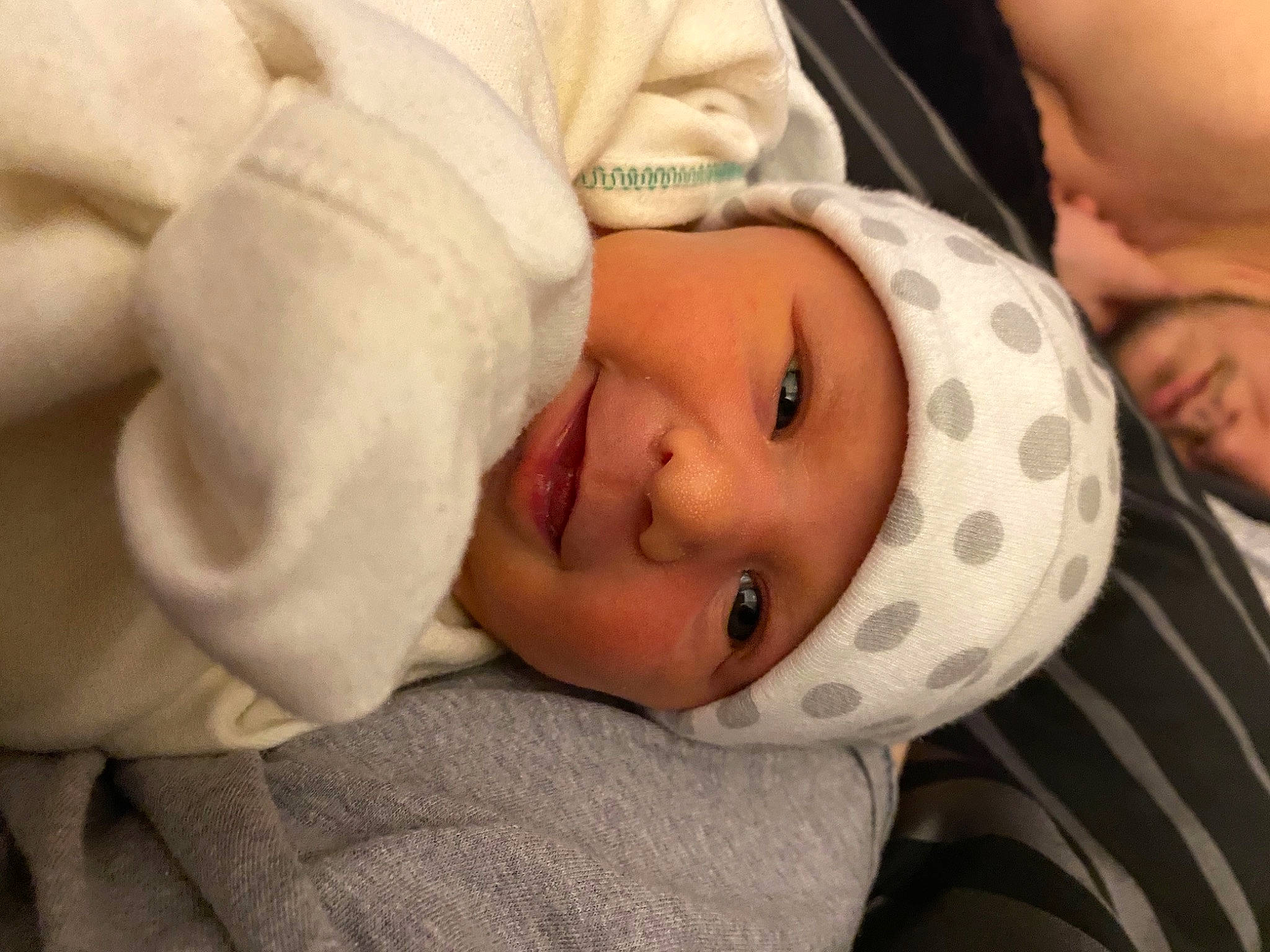 Braelyn is registered to the contest to win money with this photo: baby, baby_products, baby_sleeping, baby_toddler_clothing, cheek, child, comfort, eyebrow, facial_expression, headwear, human, linens, nose, person, plush, skin, stuffed_toy, toddler