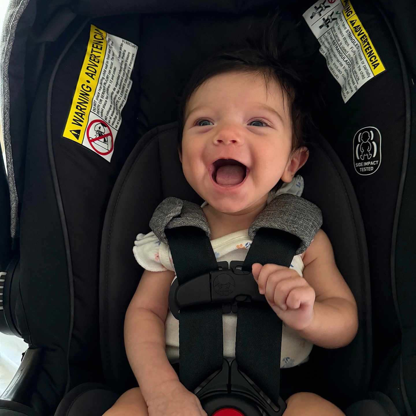 Iris joined the competition — help win amazing prizes! baby, babylaughing, bodypart, car, car_interior, carseat, cushion, face, finger, hand, happy, head, laughing, person, photography, portrait, smile, stroller, transportation, vehicle