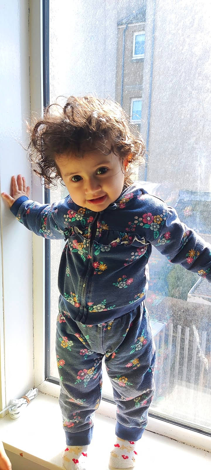 Kiana joined the competition — help win amazing prizes! baby, baby_toddler_clothing, blue, child, face, facial_expression, fashion, flooring, fun, hairstyle, human, outerwear, pattern, person, shoulder, skin, sleeve, standing, t_shirt, toddler