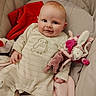 baby, blanket, bunny, child, comfort, cozy, cushion, cute, indoors, infant, onesie, pink_blanket, plush, portrait, red_blanket, seated, smiling, soft_toys, stuffed_animal, warm
