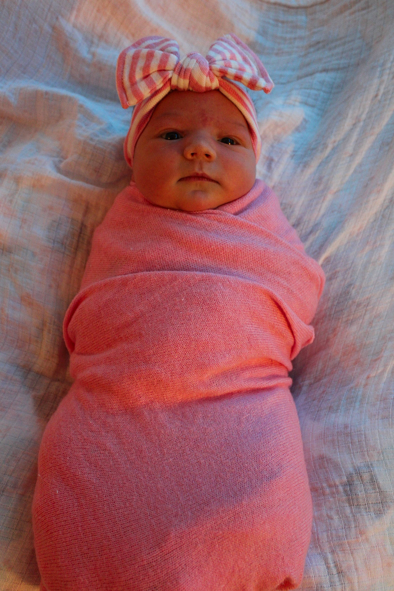 Kelsie is registered to the contest to win money with this photo: baby, baby_products, baby_toddler_clothing, cap, cheek, child, comfort, face, fun, hat, headgear, headwear, linens, lip, magenta, orange, peach, person, pink, portrait_photography