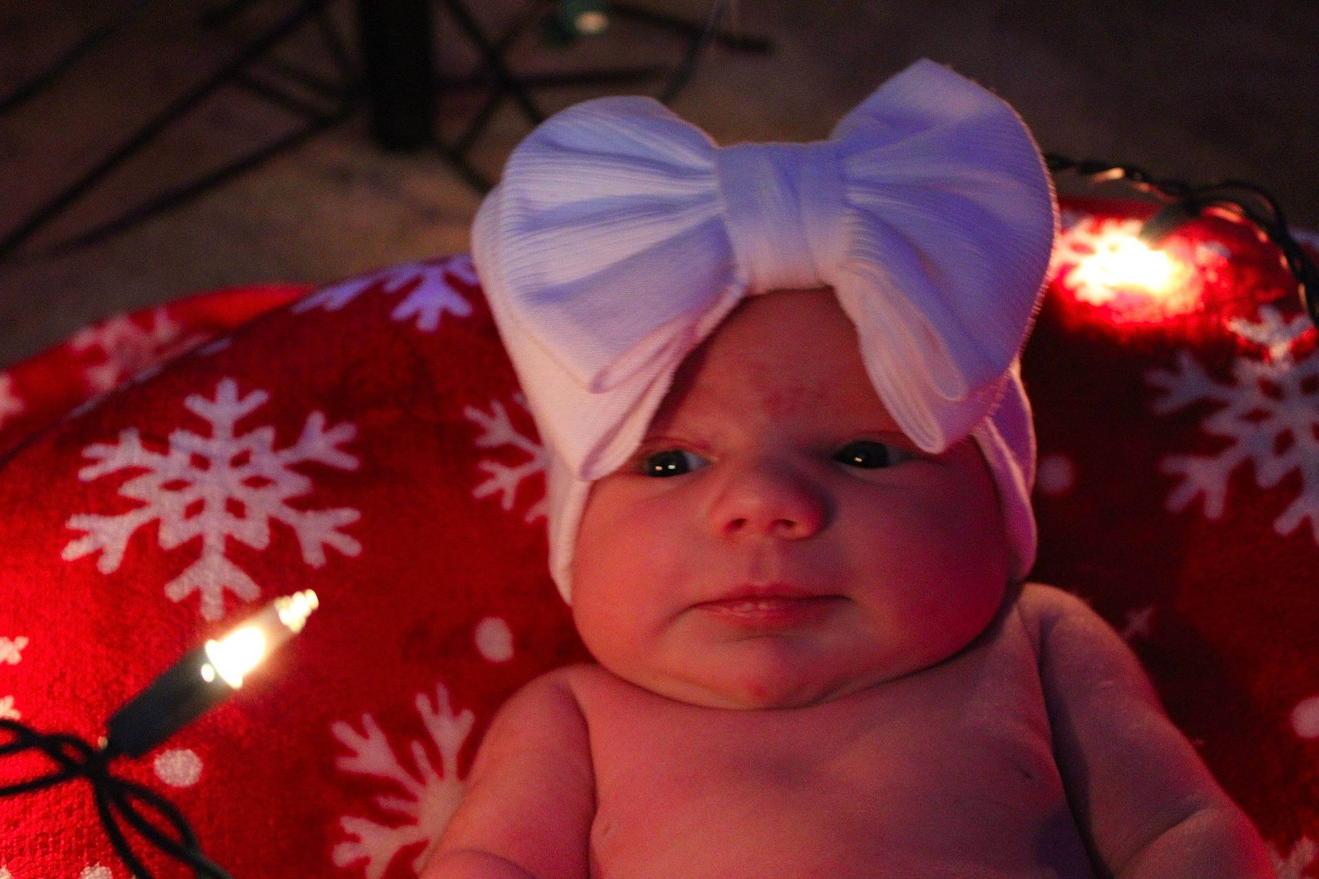 Kelsie is registered to the contest to win money with this photo: baby, baby_toddler_clothing, carmine, child, christmas, costume_hat, event, fashion_accessory, fun, happy, headwear, holiday, light, lighting_accessory, magenta, organ, person, pink, purple, room