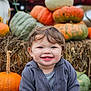 autumn, background, casual, child, clothing, cute, face, fall, happy, harvest, hay_bale, head, nature, outdoor, person, portrait, pumpkin, seasonal, smiling, toddler