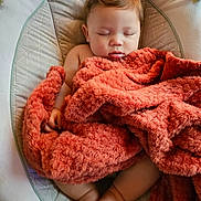 Lucas joined the competition — help win amazing prizes! baby, blanket, sleeping, infant, child, soft_texture, baby_chair, cozy, relaxing, indoor, cute, peaceful, resting, fuzzy_blanket, small_feet, nap_time, comfort, portrait, toddler, skin