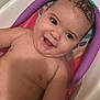 Alani is registered to the contest to win money with this photo: baby, child, bath, bathtub, water, smile, happy, skin, wet_hair, infant, playful, cushion, purple, pink, cute, indoors, closeup, person, young, joyful