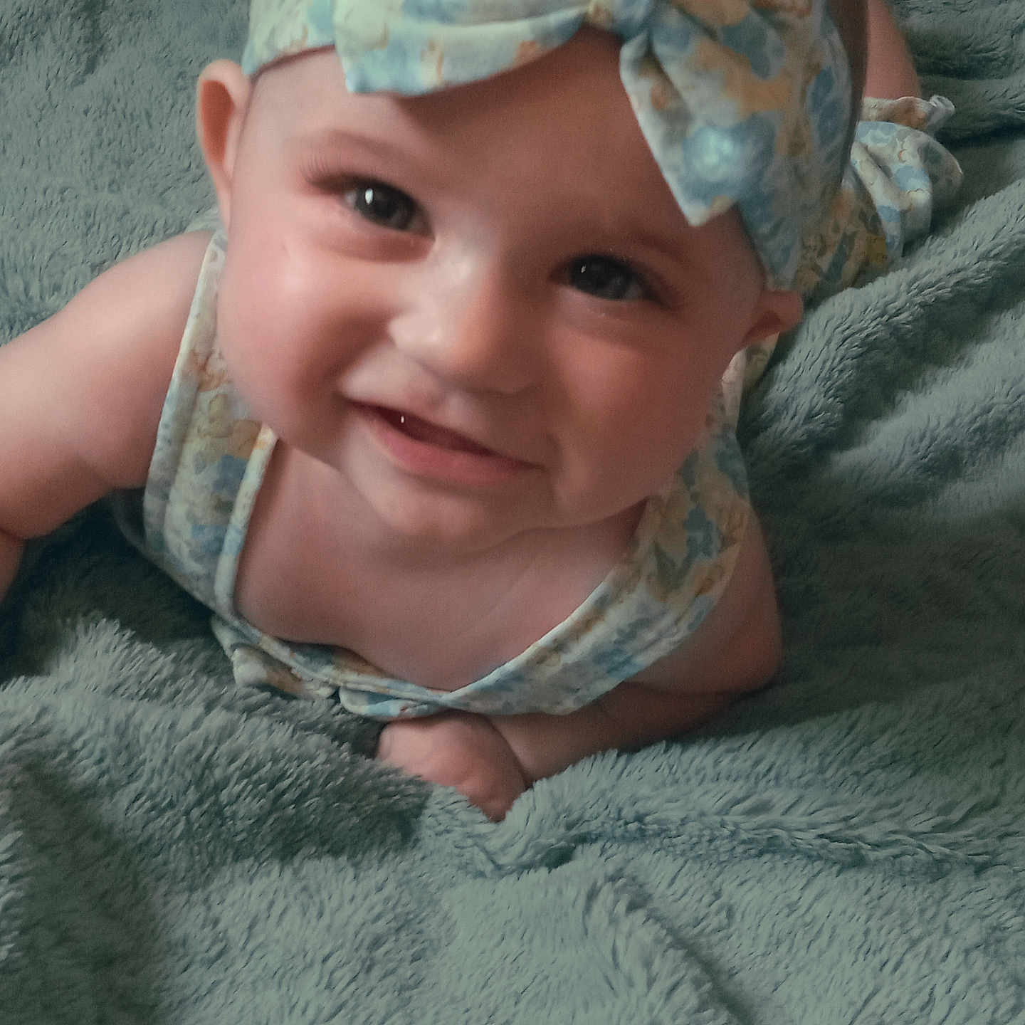 Brinnley joined the competition — help win amazing prizes! accessories, baby, bodypart, bonnet, cap, clothing, face, finger, hand, happy, hat, head, headband, homedecor, newborn, person, photography, portrait, smile, towel