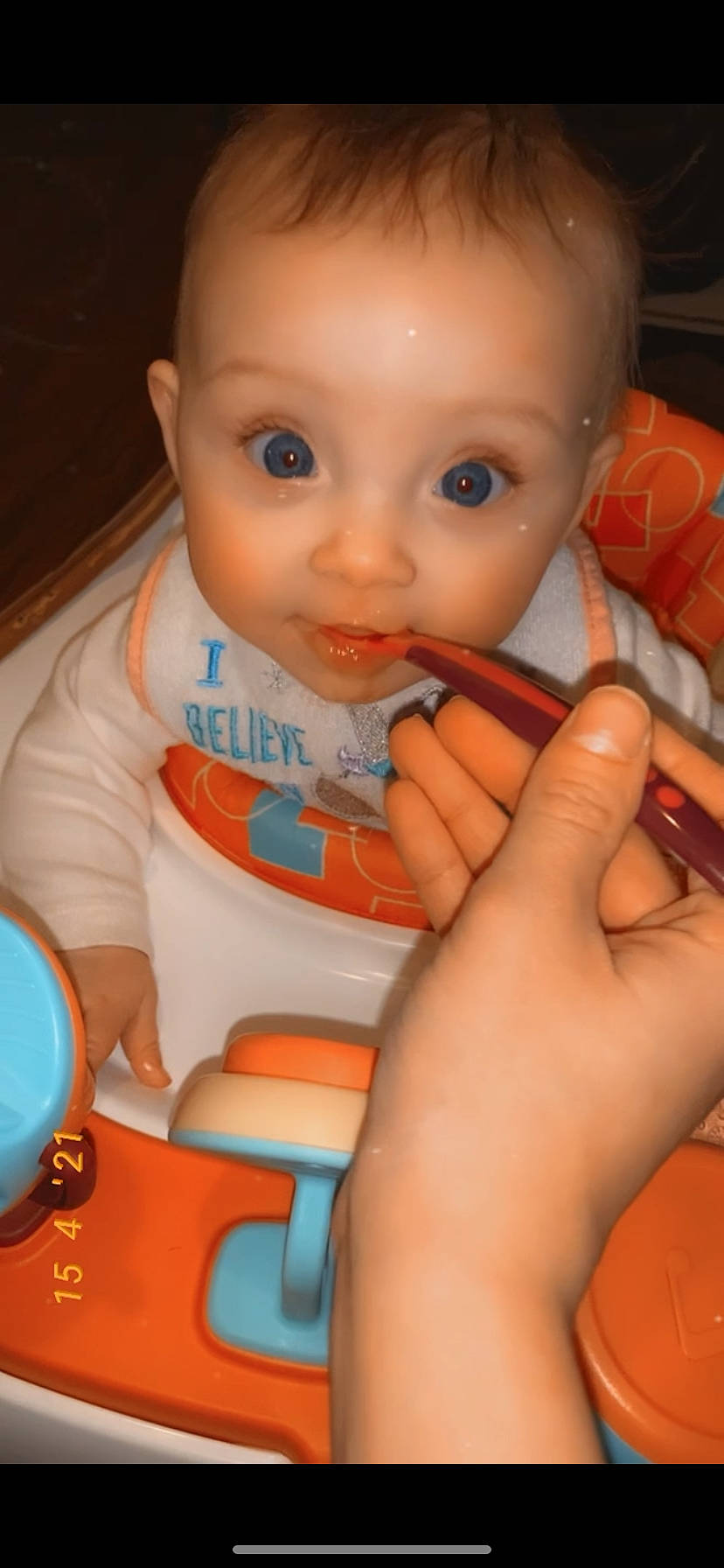 Vanabelle is registered to the contest to win money with this photo: baby, baby_toddler_clothing, cheek, chest, child, eyelash, finger, fun, gesture, human_body, iris, lip, mouth, nose, orange, person, product, skin, surprise, thumb